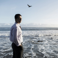 TripleNine-Business-Man-On-Beach.jpg